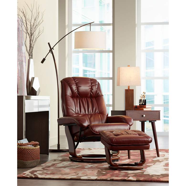 Image 1 Kyle Ruby Red Faux Leather Ottoman and Swiveling Recliner in scene