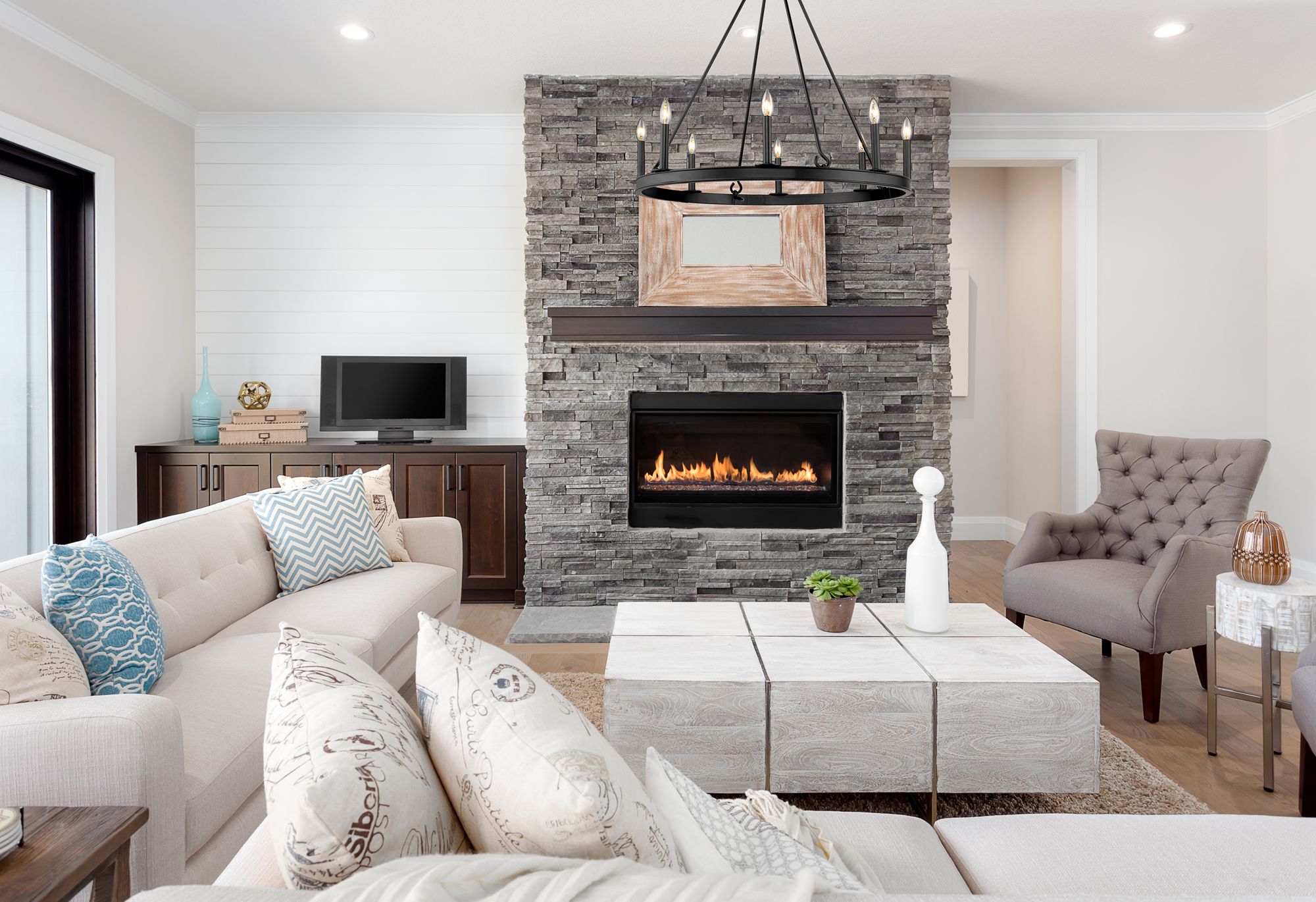 Barclay 33" Wide Matte Black 8-Light Wagon Wheel Chandelier in scene