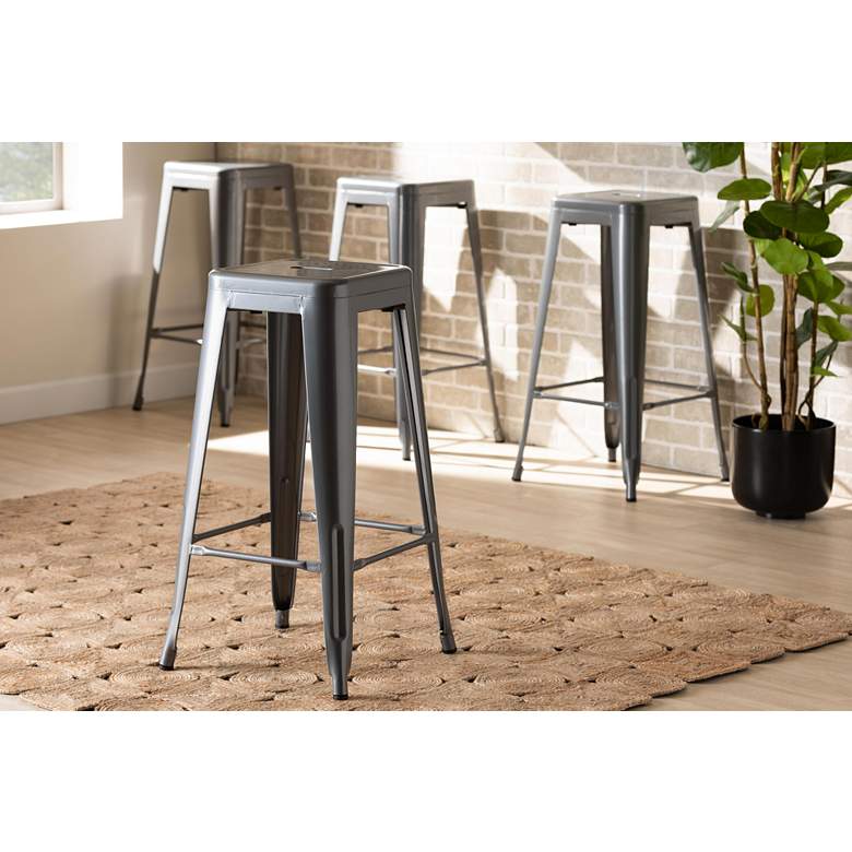 Image 1 Horton 30 1/4 inch Gray Metal Stackable Bar Stools Set of 4 in scene