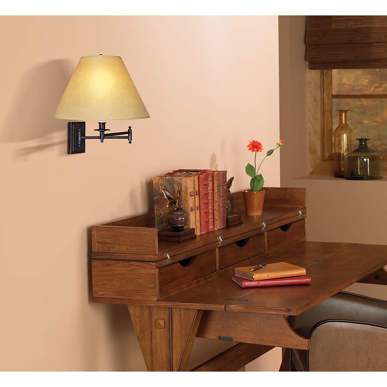 Image 1 Kinetic Collection Plug-In Swing Arm Wall Lamp in scene