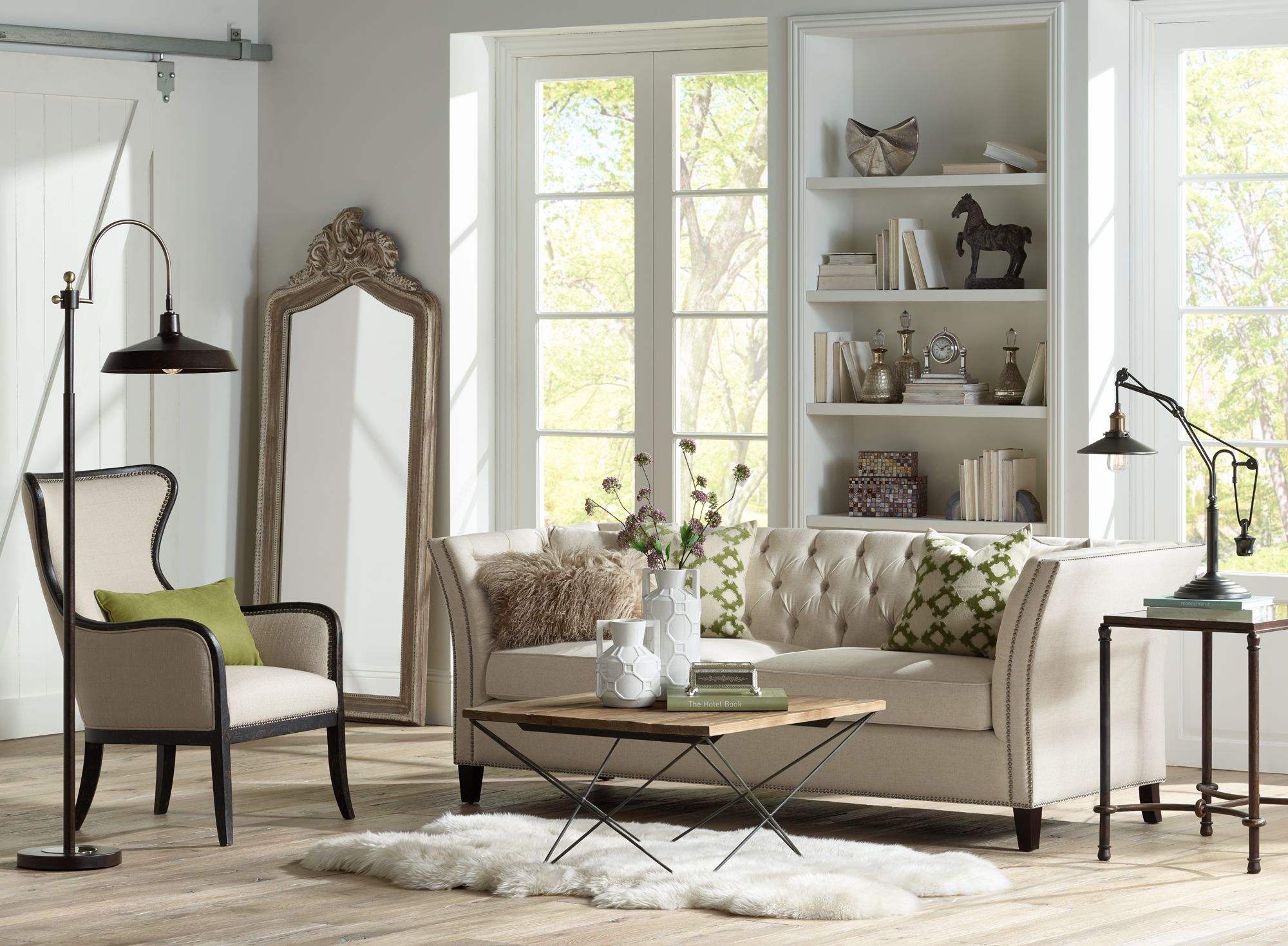 Uttermost 25" Wide Warring Rustic Bronze and Glass End Table in scene