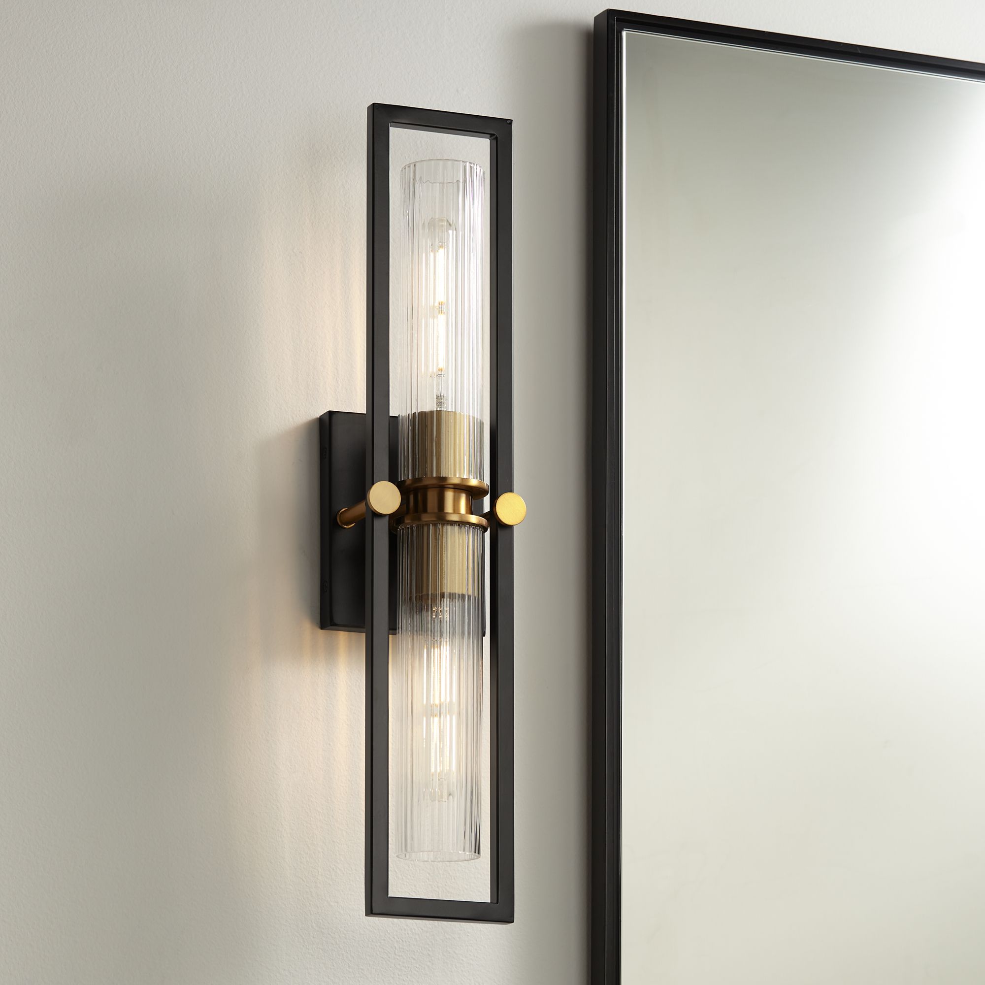 Stiffel Ramos 24" High Black and Brass 2-Light Wall Sconce in scene