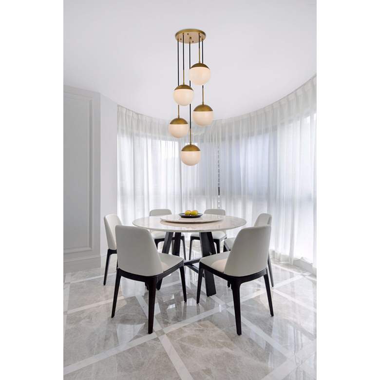 Image 1 Eclipse 18" Wide 5-Light Modern Brass and White Globe 5-Light Pendant in scene