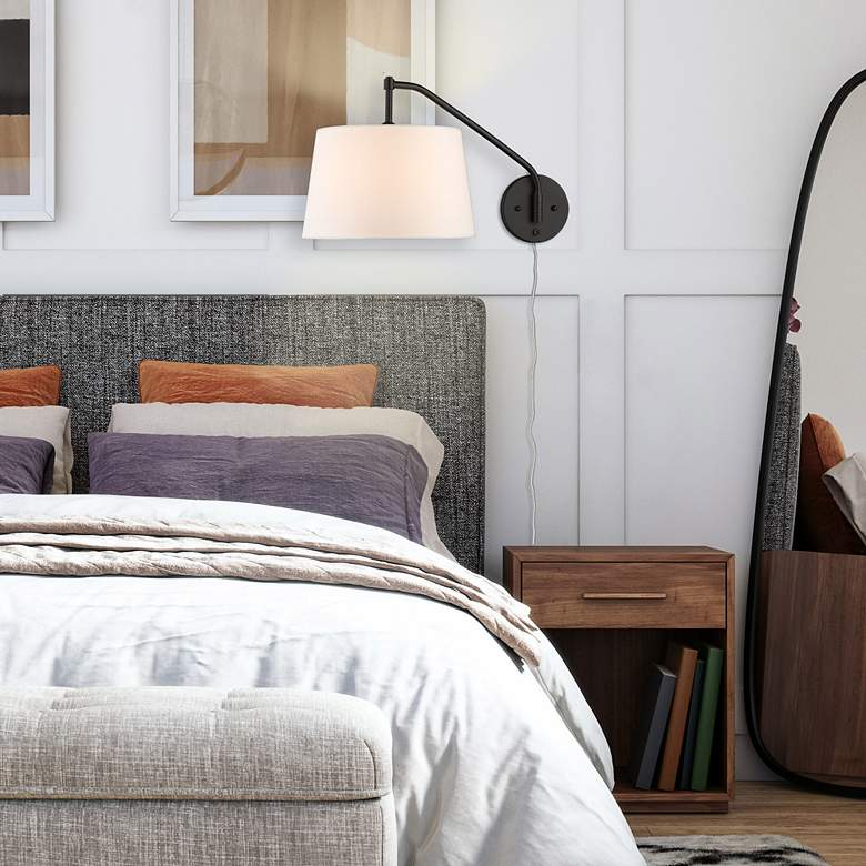 Image 1 Ryleigh Matte Black Plug-In Swing Arm Wall Lamp in scene