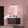 1_Kichler Tully 24" Wide Black 3-Light Bath Light in scene