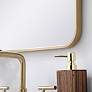 18-in W x 36-in H Soft Corner Metal Rectangular Wall Mirror in Brass in scene