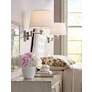 Possini White Linen Shade Brushed Nickel Adjustable Plug-In Wall Lamp in scene