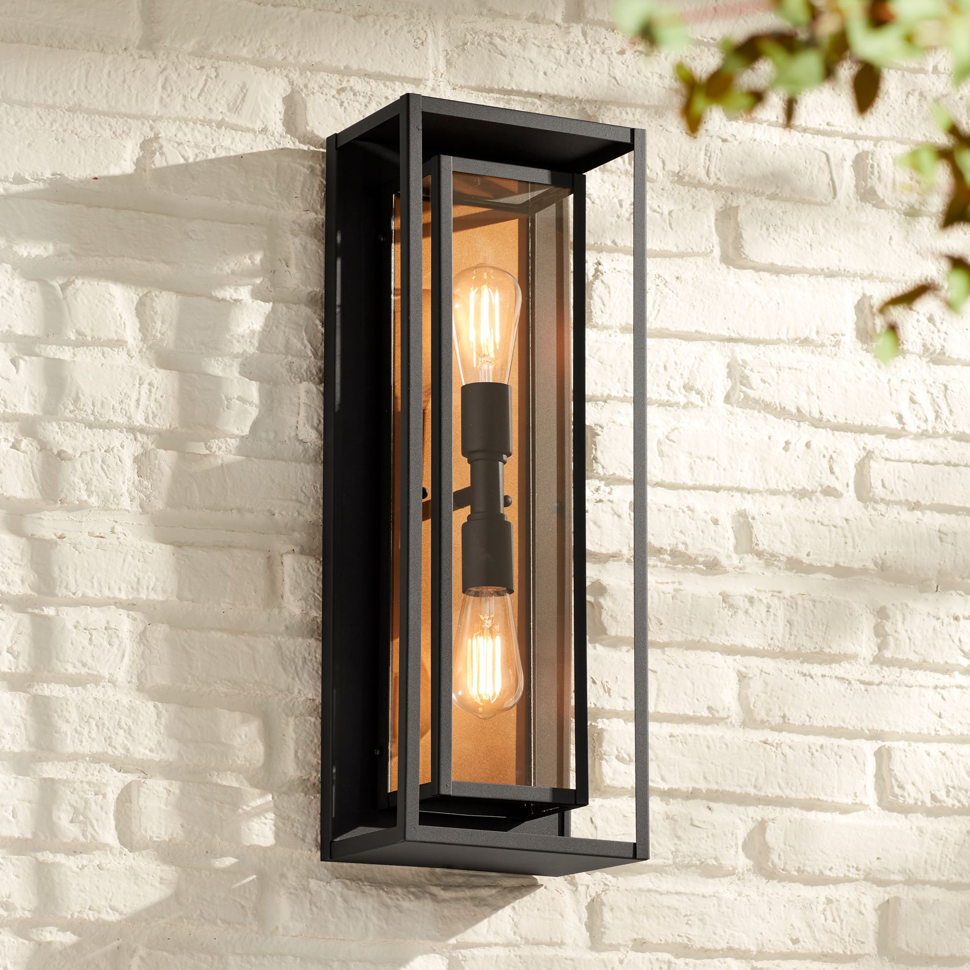 Possini Euro Metropolis 22" High Black and Gold Outdoor Wall Light in scene