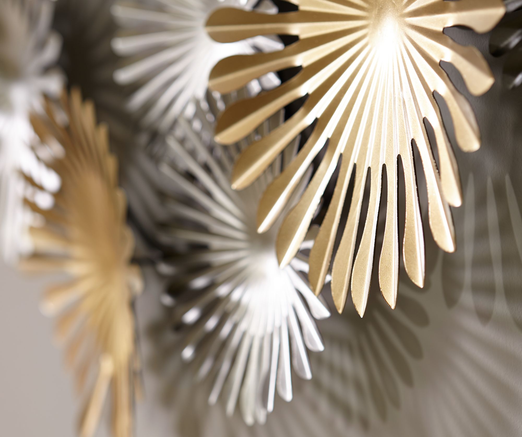 Sparks 45" Wide Gold and Silver Metal Wall Art in scene