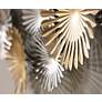 Sparks 45" Wide Gold and Silver Metal Wall Art in scene