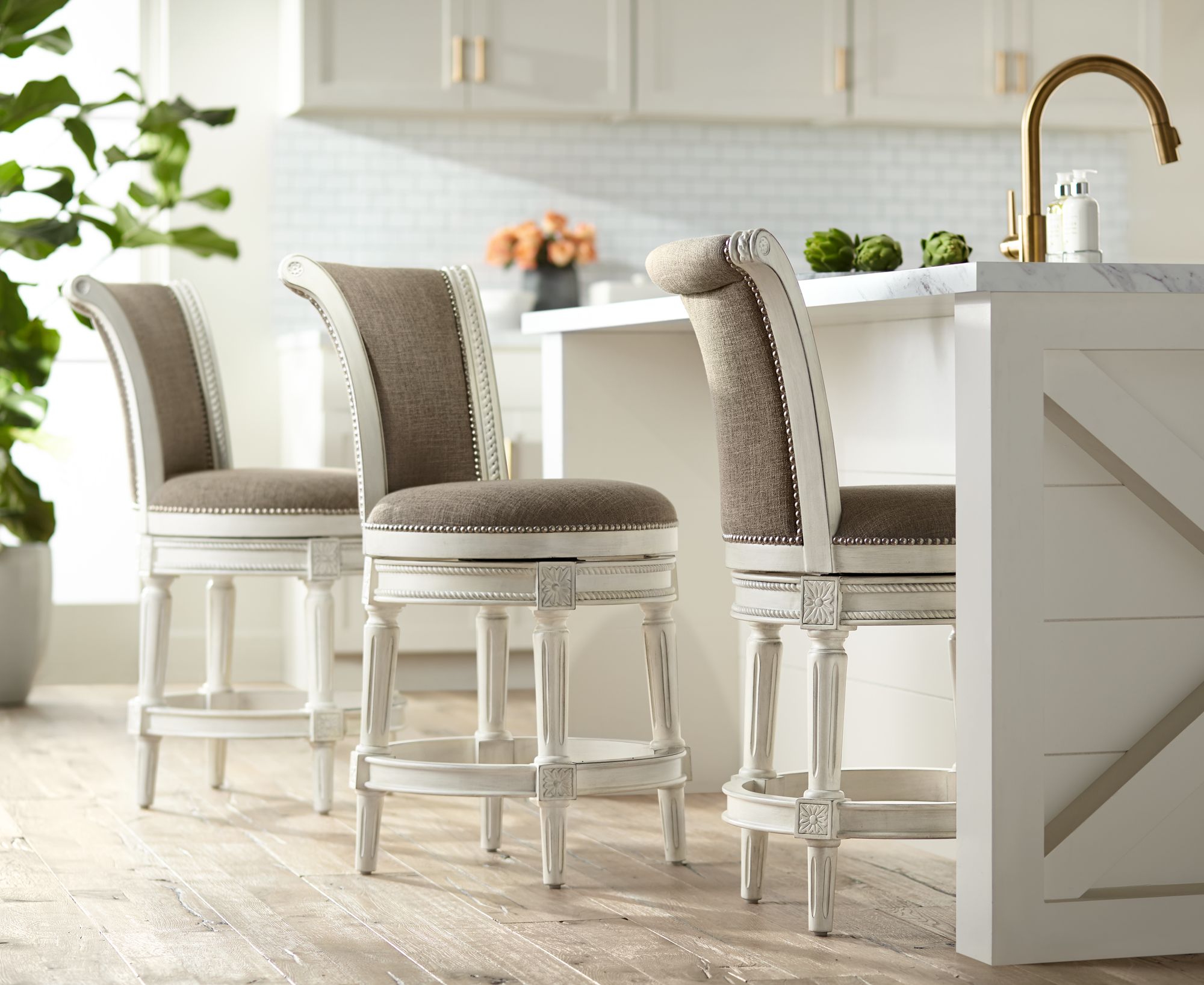 55 Downing Street Oliver 24 1/2" Pewter and White Swivel Counter Stool in scene