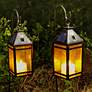 1_Henderson 12 1/4"H Black Solar LED Candle Hanging Lantern in scene
