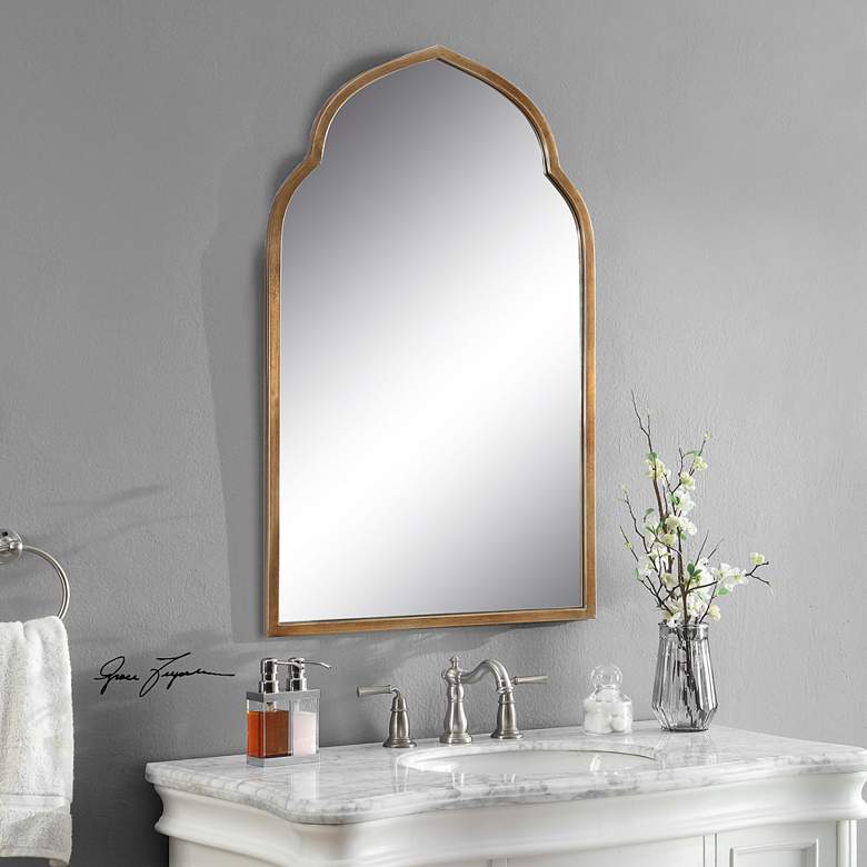 Image 1 Kenitra 40 inch x 24 inch Moroccan Arch Top Gold Wall Mirror in scene