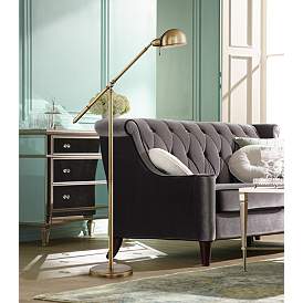 Image1 of 360 Lighting Dawson Antique Brass Adjustable Boom Arm Pharmacy Floor Lamp in scene