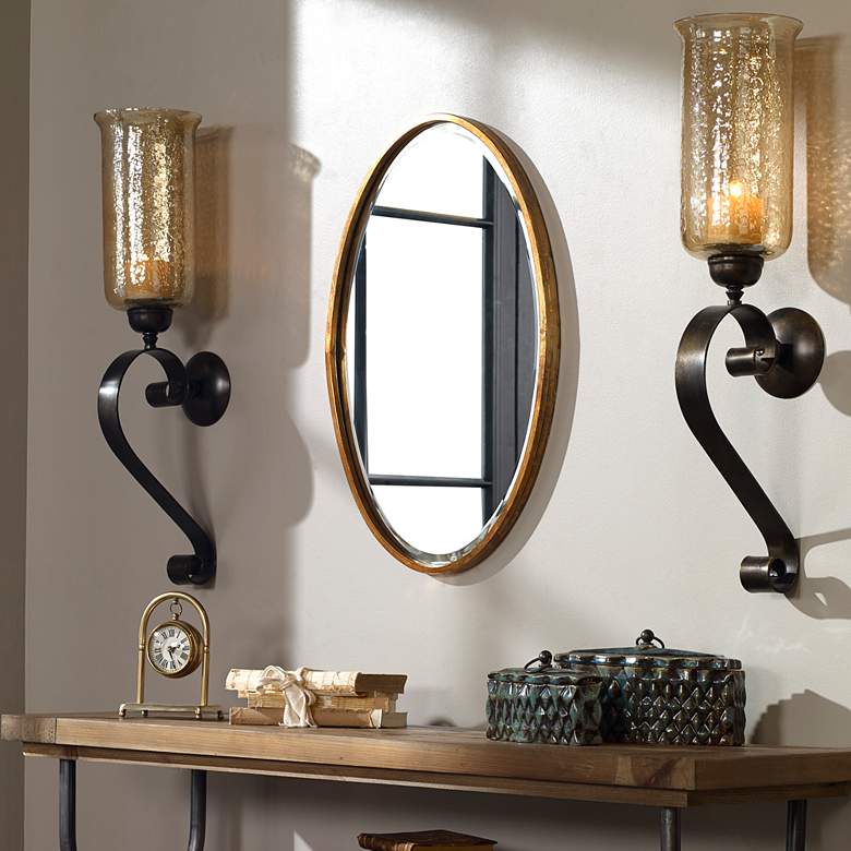 Image 1 Uttermost Herleva 17 3/4" x 28" Antique Gold Oval Wall Mirror in scene