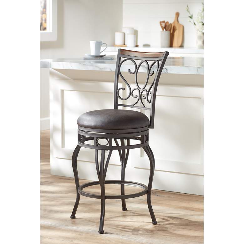 Image 1 Trevi 26 1/2 inch Wood and Bronze Metal Scroll Back Swivel Counter Stool in scene