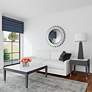 1_Baka Silver 41" Round Sunburst Oversized Wall Mirror in scene