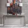 Uttermost Hayley 60" Wide Clear Glass and Silver Console Table in scene