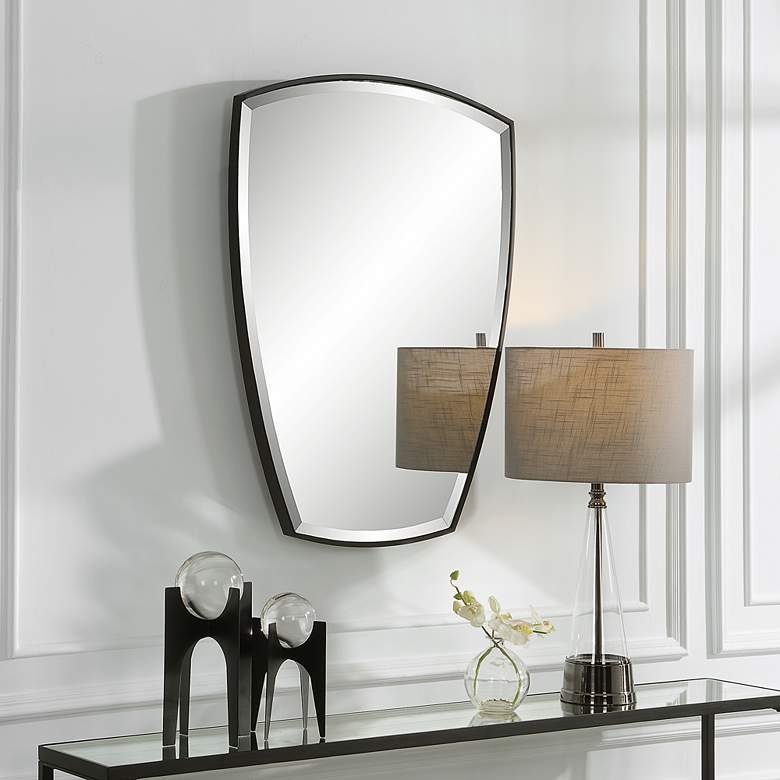 Image 1 Uttermost Crest Satin Black 25 1/4 inch x 36 inch Shield Wall Mirror in scene