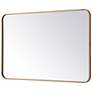 24-in W x 36-in H Soft Corner Metal Rectangular Wall Mirror in Brass in scene