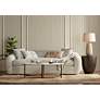 1_Madison Park Beauchamp White 48" Wide Oval Wood Modern Coffee Table in scene