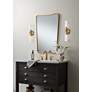 1_Uttermost Segundo Brass Metal 22" x 34" Wall Mirror in scene