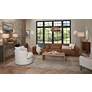 5_Uttermost Loophole 18" Brown Solid Wood Modern Accent Table in scene