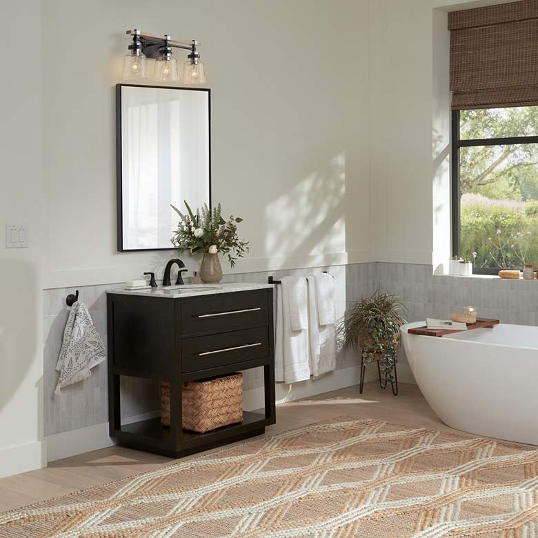 Image 1 Possini Broadway 23" Wide Black and Painted Wood 3-Light Bath Light in scene