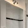 1_Bryant 24" Wide Matte Black 3-Light Vanity Bath Light in scene