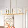 Possini Euro Kime 50" Gold 8-Light Modern Trestle Linear Chandelier in scene