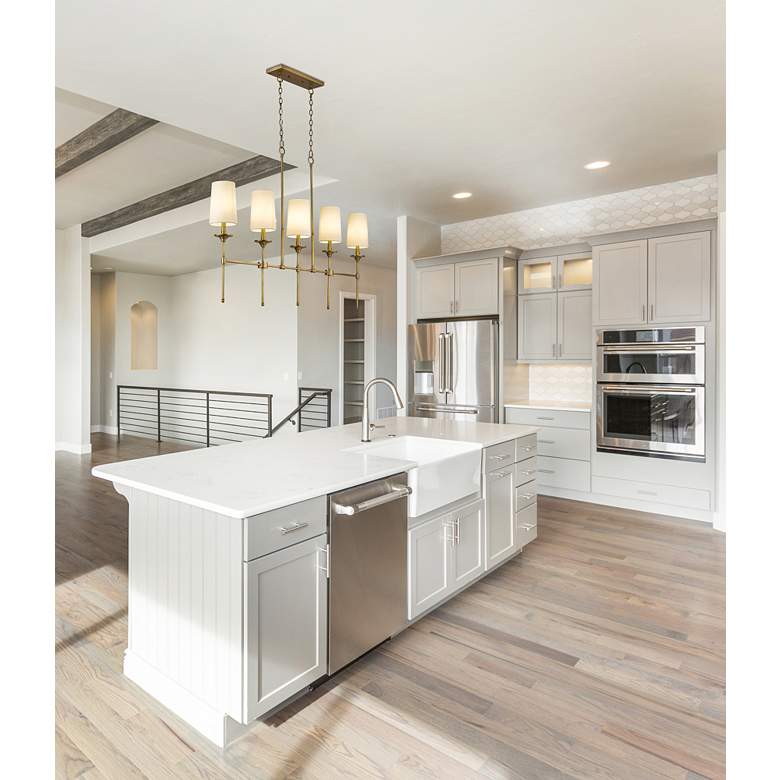 Image 1 Emily 51" Wide Rubbed Brass Steel 5-Light Linear Pendant in scene
