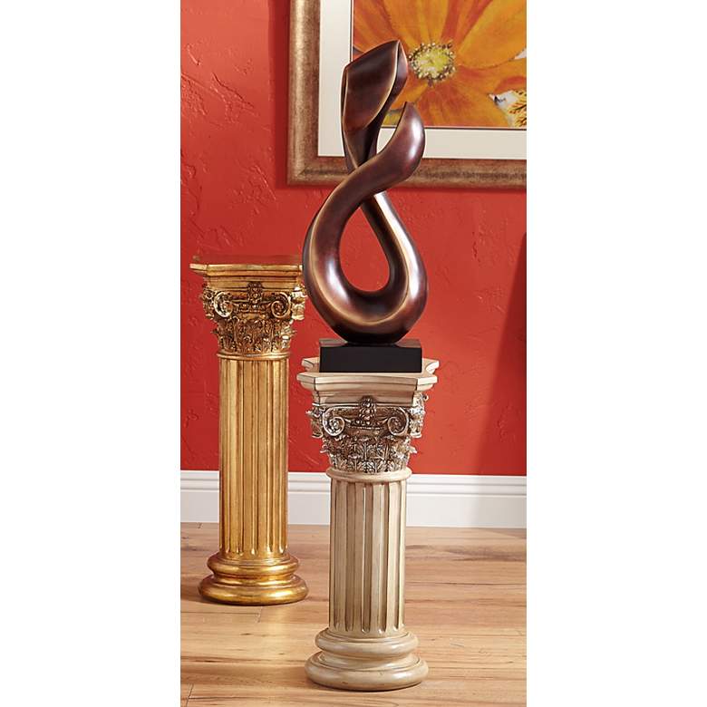 Image 1 Open Infinity 25 inch High Gold Sculpture in scene