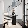 1_TOV Chelsea 26" Wide Modern Black Oak Wood Round Entry Table in scene