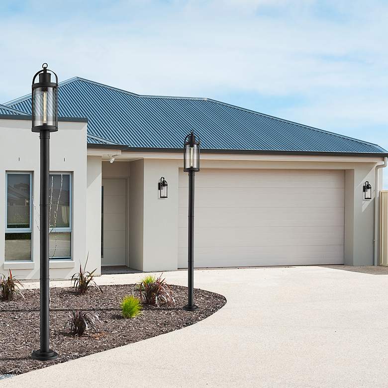 Image 1 Roundhouse 24 3/4" High Black Outdoor Wall Light in scene