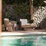 1_TOV Eclipse 47 1/4" Wide Faux Travertine Indoor-Outdoor Coffee Table in scene