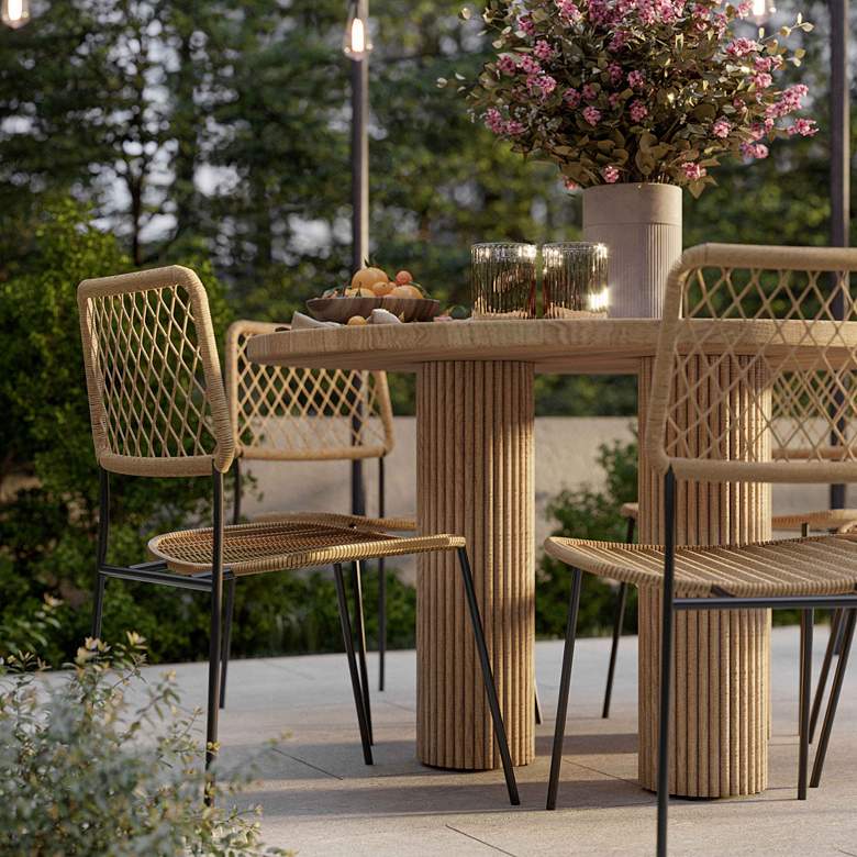 Image 1 TOV Patti 55" Wide Faux Travertine Round Indoor-Outdoor Dining Table in scene