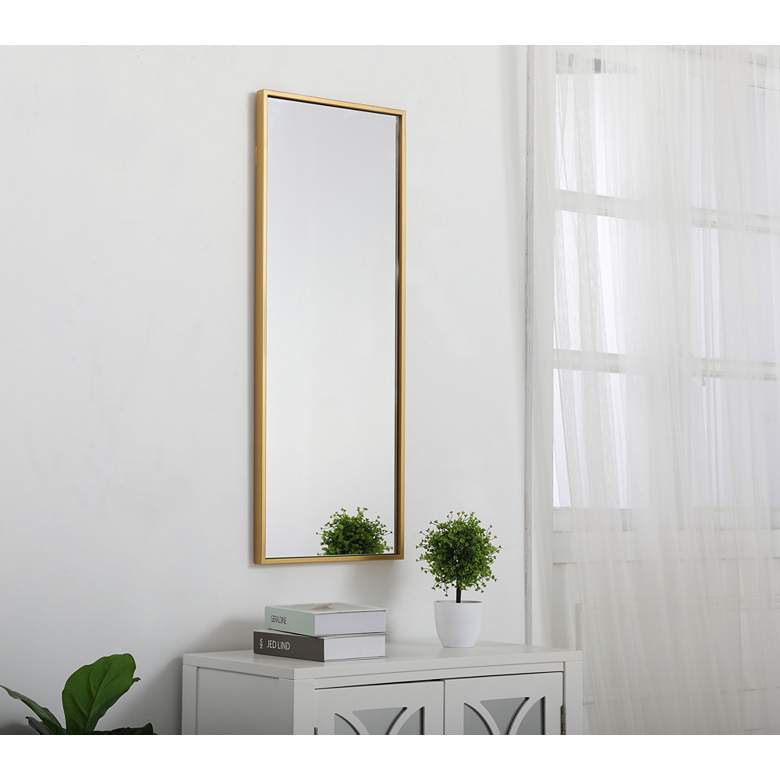 Image 1 14-in W x 36-in H Metal Frame Rectangle Wall Mirror in Brass in scene