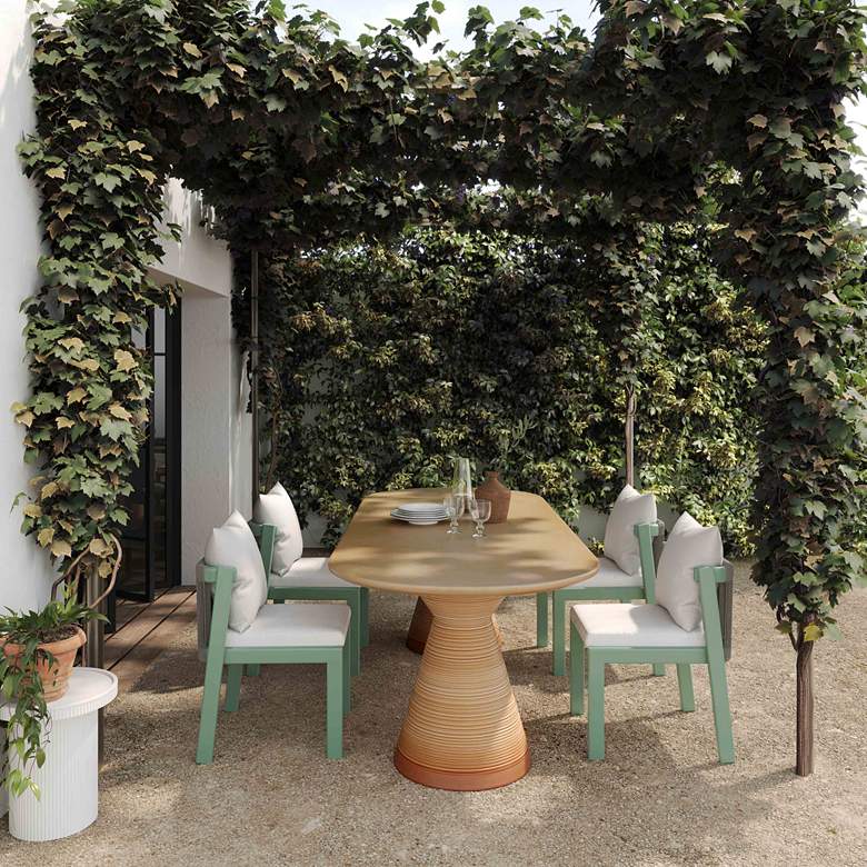 Image 1 TOV Fassa 86 3/4" Wide Terracotta Oval Indoor-Outdoor Dining Table in scene