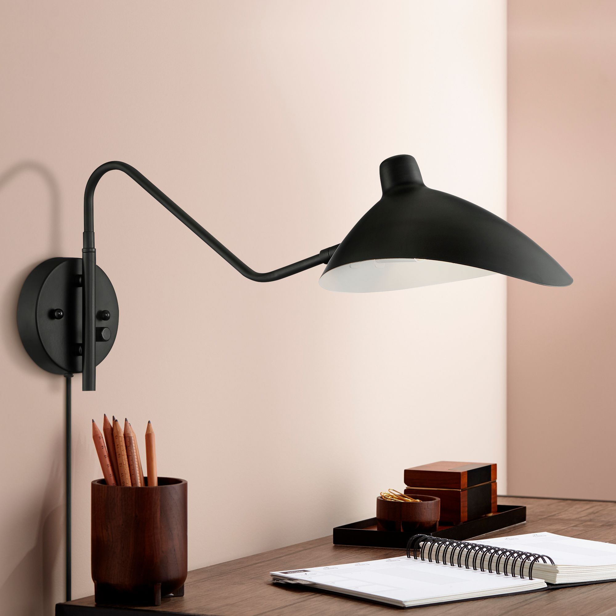 Watch A Video About the Colborne Black Finish Plug-In Swing Arm Modern Wall Lamp