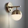 360 Lighting Luna Brass and White Glass Globe Modern Plug-In Wall Lamp