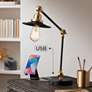 360 Lighting Taurus Black and Gold Adjustable Desk Lamp with USB Ports in scene