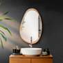 1_Howard Elliott Dragmar Wood 23" x 35" Oval Wall Mirror in scene