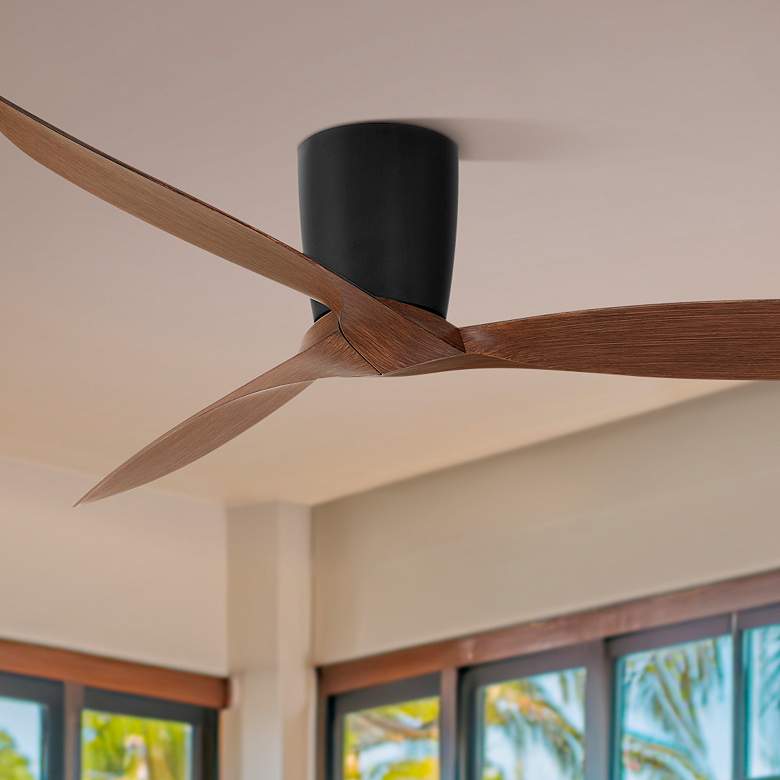 Image 1 56" Casa Vieja Tre Black and Walnut Indoor-Outdoor Hugger Ceiling Fan in scene