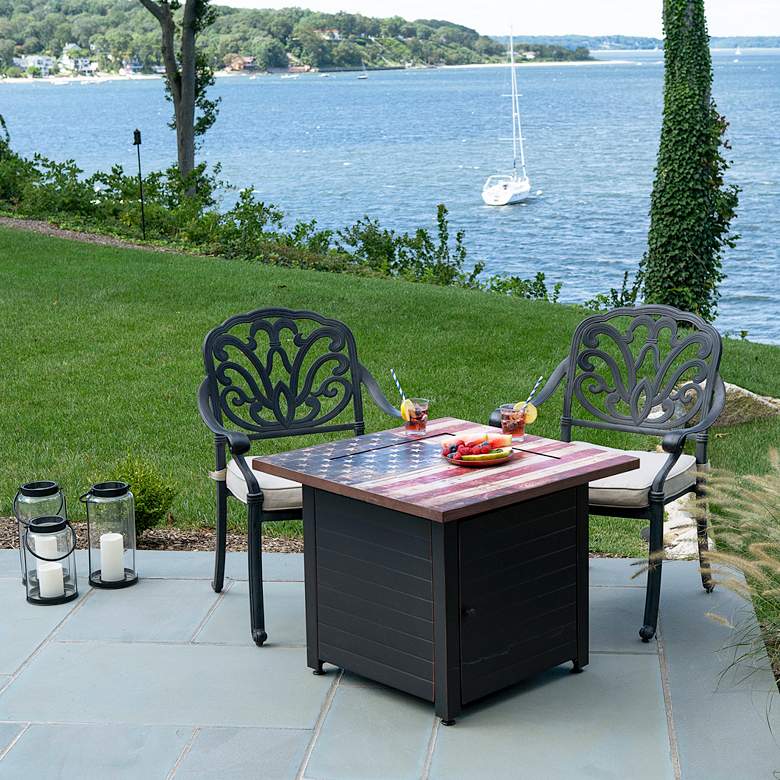 Image 1 The Liberty 30"W Black Bronze LP Gas Outdoor Fire Pit Table in scene