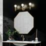 Thumbnail1 of Kichler Torche 24 1/4"W Champagne Bronze 3-Light Bath Light in scene