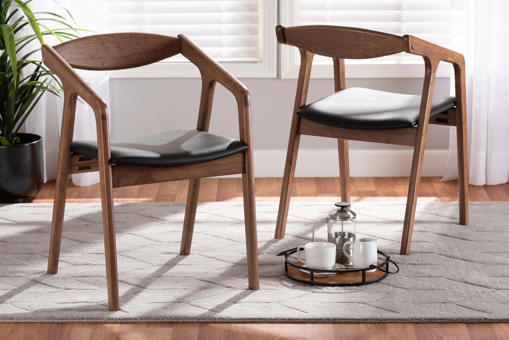 Image 1 Harland Black Faux Leather and Wood Dining Chairs Set of 2 in scene