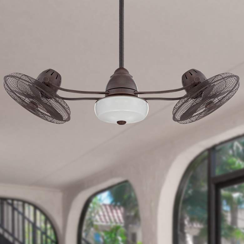 Image 1 48 inch Craftmade Bellows II Bronze Damp Rated Rotational Fan with Remote