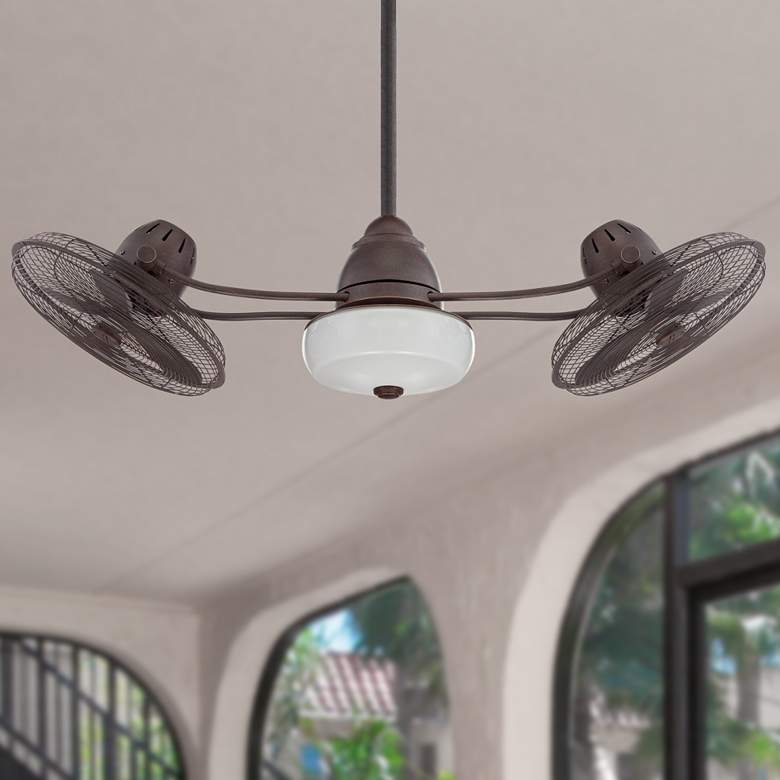 Image 1 48" Craftmade Bellows II Bronze Damp Rated Rotational Fan with Remote