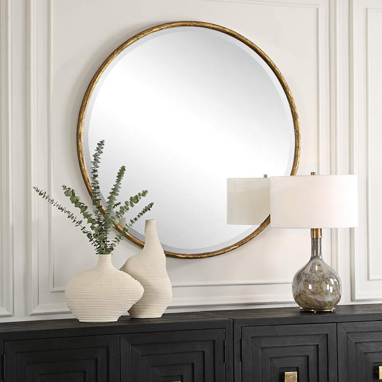 Image 1 Uttermost Sutton Aged Gold 47" Round Oversized Wall Mirror in scene