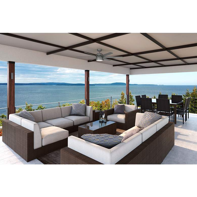 Image 1 60" Hunter Solaria Silver LED Damp Rated Ceiling Fan with Wall Control in scene